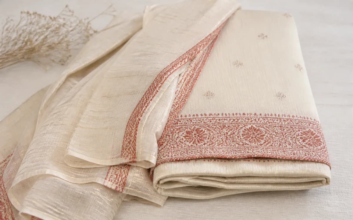 Editorial still life of unstitched suit fabric, representing ethnic sets & suits sourcing in Surat, Gujarat