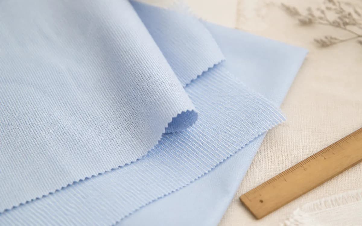 Editorial still life of handloom fabric, representing fabrics & textiles sourcing in Erode, Tamil Nadu