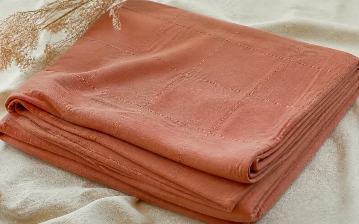 Editorial still life of woven cloth, representing fabrics & textiles sourcing in Erode, Tamil Nadu