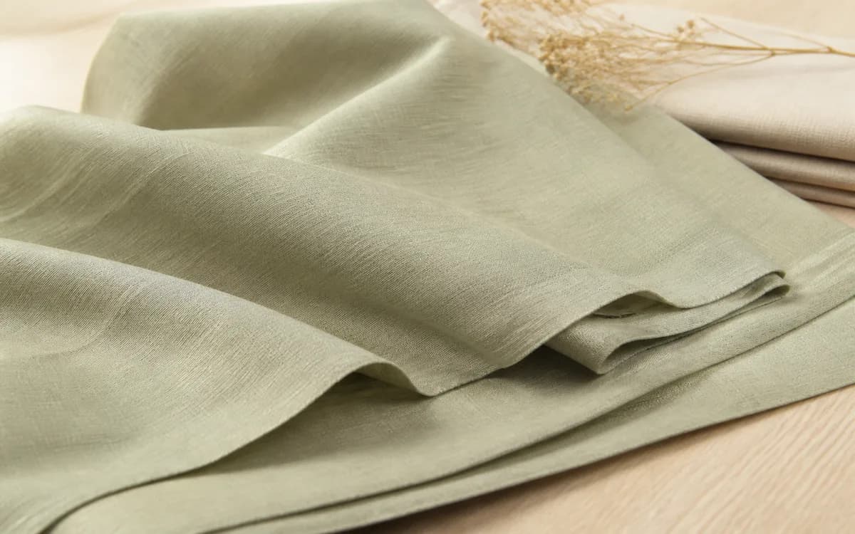 Editorial still life of cotton bed linen, representing home textiles sourcing in Panipat, Haryana