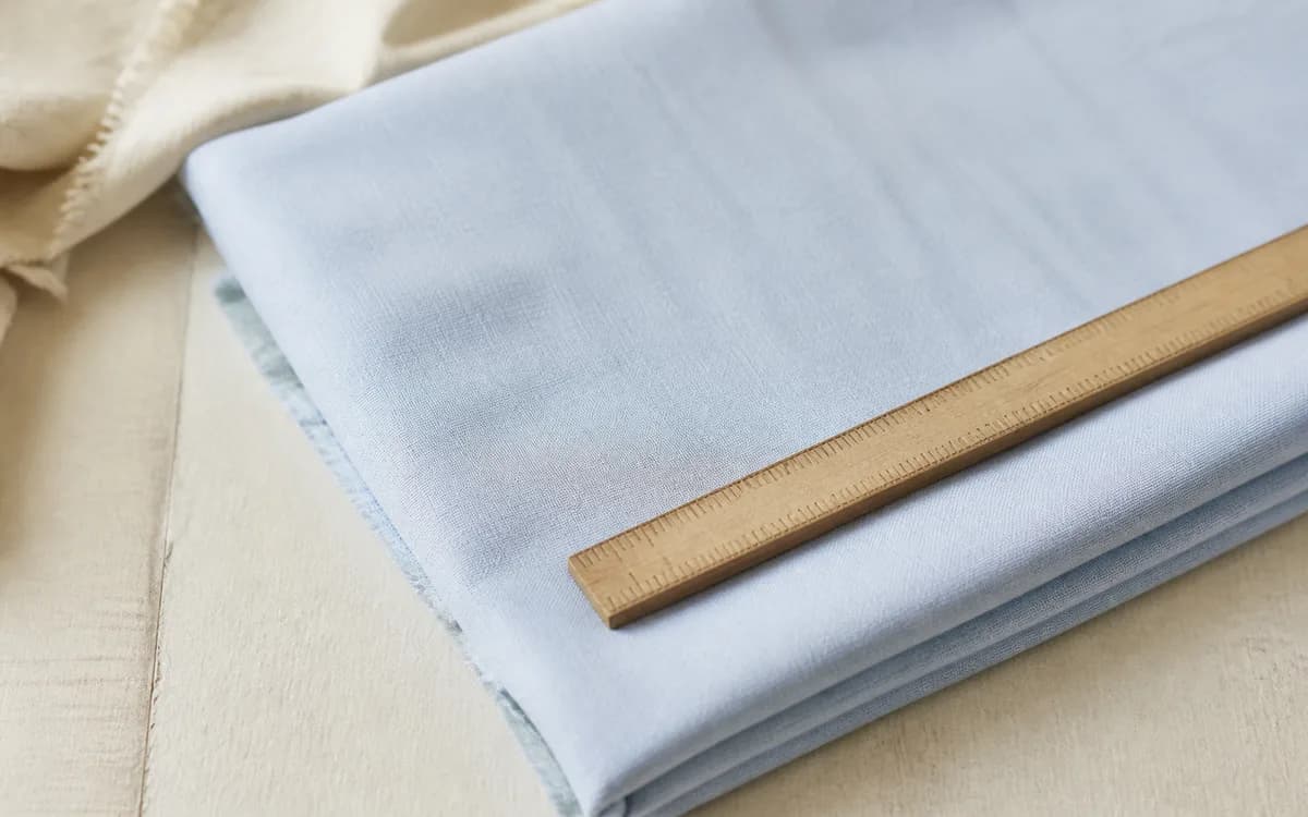 Editorial still life of cotton shirting, representing men's shirts & shirting sourcing in Ahmedabad, Gujarat