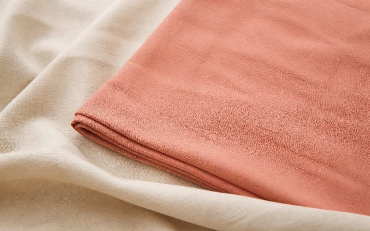 Editorial still life of cotton uniform shirts, representing uniforms & workwear sourcing in Jaipur, Rajasthan